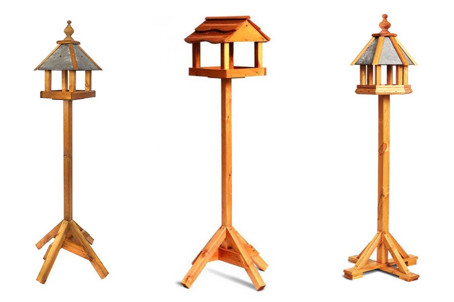 A selection of Tom Chambers bird tables in different styles